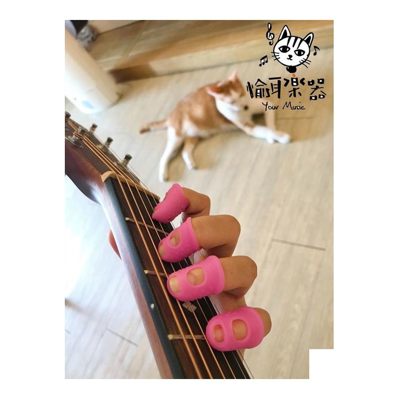 ♪ Your Music 愉耳樂器♪吉他專用 防痛指套 初學者必備 按弦好幫手一組四個 吉他專用 防痛指套 初學者必備 按弦好幫手一組四個 — 三峽吉他 / Bass