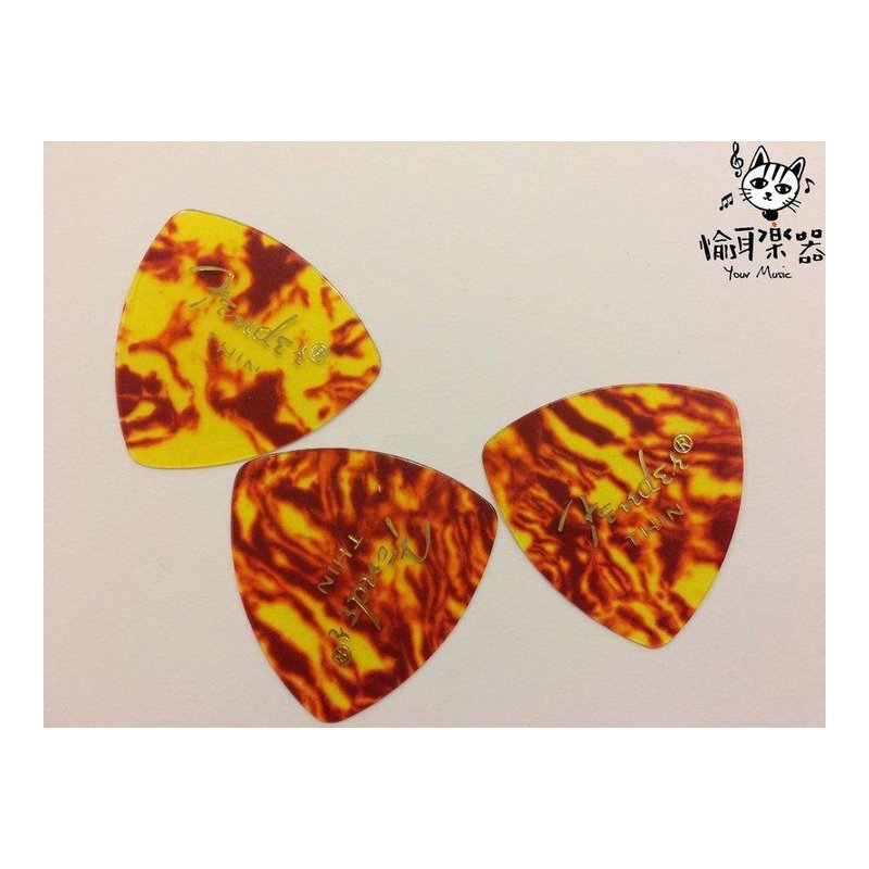 ♪ Your Music 愉耳樂器♪全新 FENDER 琥珀紋路大三角匹克 THIN 全新 FENDER 琥珀紋路大三角匹克 THIN — 三峽配件 / 週邊