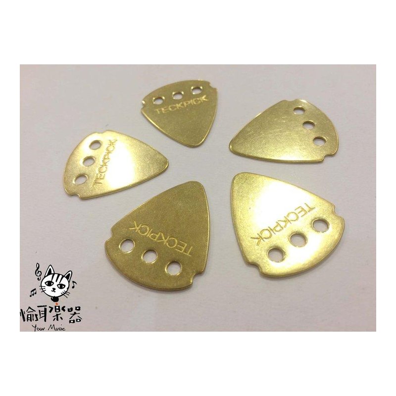 ♪Your Music 愉耳樂器♪美國進口金色 Jim Dunlop 吉他彈片吉他匹克 PICK(金屬) 可做飾品項鍊 美國進口金色 Jim Dunlop 吉他彈片吉他匹克 PICK(金屬) 可做飾品項鍊 — 三峽吉他 / Bass